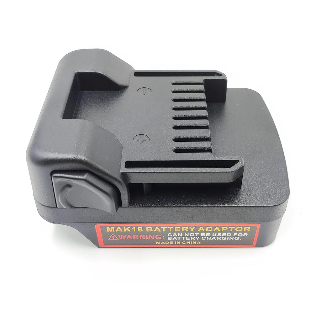 Makita 18V LXT to Metabo HPT 18V battery adapter - tool-side fins and + marks, warning label at the base