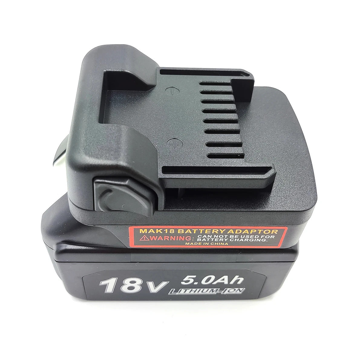 Makita 18V LXT to Metabo HPT 18V battery adapter - fitted to the Makita 18V LXT battery, adaptor warning label along the side