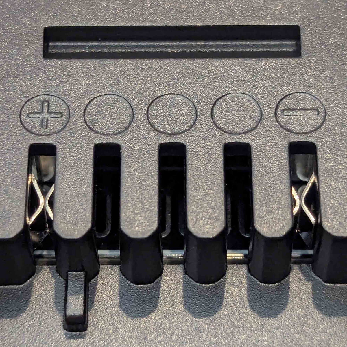 Makita 18V LXT to Ozito 18V PXC battery adapter - close-up of the Ozito tool-side connection with copper spring contacts